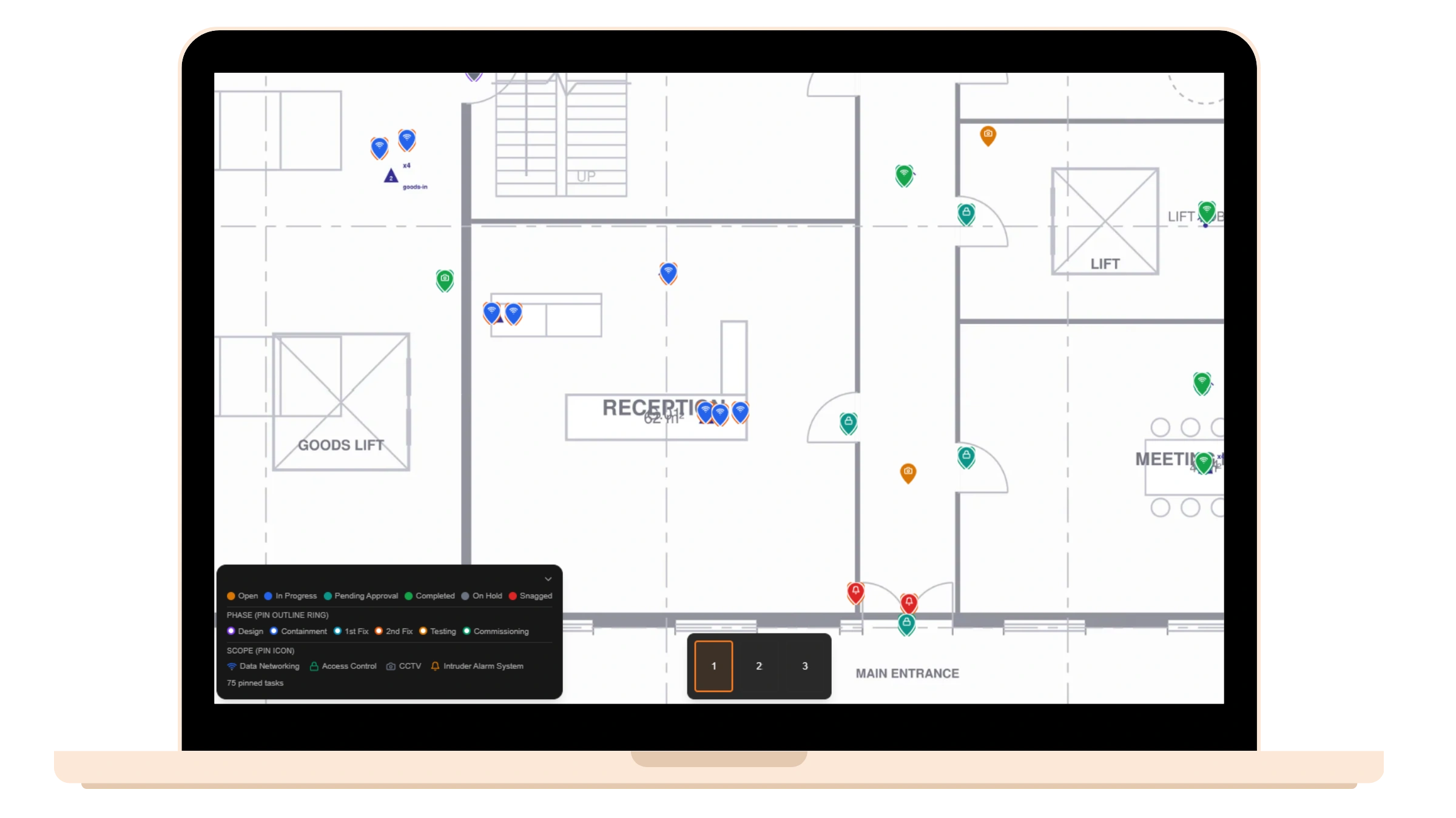 Graftix open on a laptop, showing the plan viewer with tasks pinned to a drawing